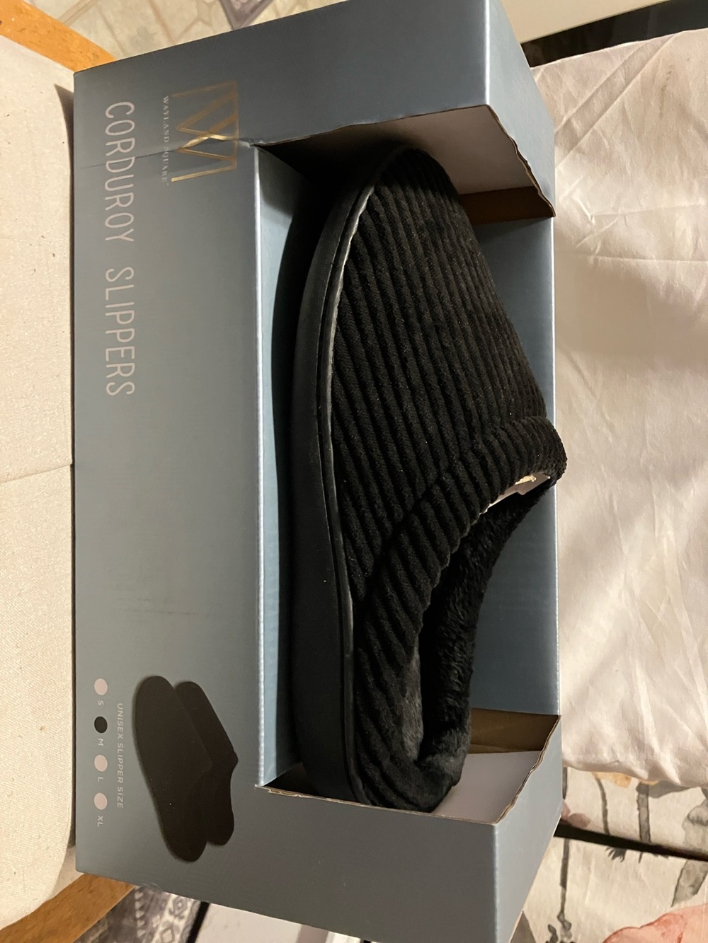 New. Unisex. Black corduroy slippers. Sz M. 8-9 Never used or removed from
